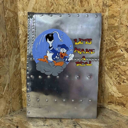 Skin panel of Douglas C-47B Dakota 44-76787 with Let's make a deal nose art for sale.